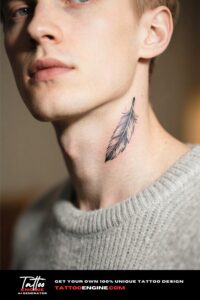 Close-up of a man with a feather neck tattoo in a grey sweater.