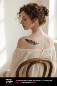 A woman with a minimalist phoenix feather tattoo on her neck in a sunlit room.