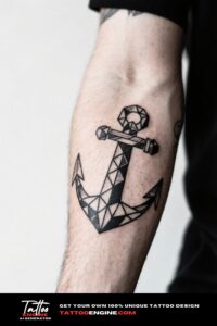 Medium shot of a man's arm with a geometric anchor tattoo in a light blue t-shirt.