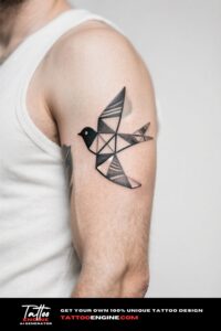Close-up of a man's forearm with a geometric bird tattoo in a dark green shirt.