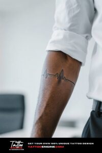 Close-up of a man's wrist with a heartbeat tattoo, wearing a rolled-up white dress shirt.