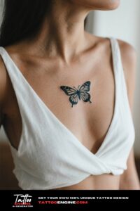 A close-up of a minimalist butterfly tattoo on a woman's ribcage with a white crop top