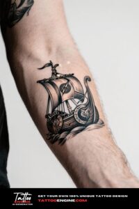 Close-up of a forearm with a Viking ship tattoo in black ink