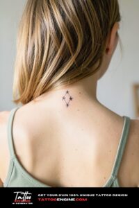 Three fine-line stars in a triangle below the hairline on the neck.